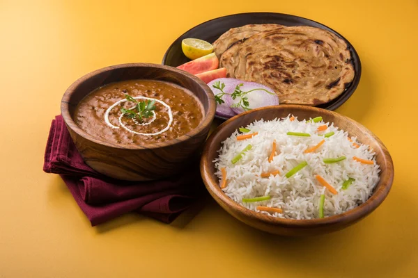 Dal Makhani or daal makhni or Daal makhani, indian lunch/dinner item served with plain rice and butter Roti, Chapati, Paratha and salad