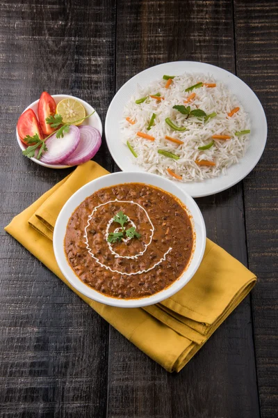 Dal Makhani or daal makhni or Daal makhani, indian lunch/dinner item served with plain rice and butter Roti, Chapati, Paratha and salad