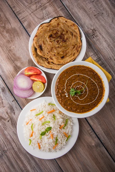 Dal Makhani or daal makhni or Daal makhani, indian lunch/dinner item served with plain rice and butter Roti, Chapati, Paratha and salad