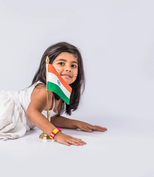 India flag and cute little indian girl, 4 year indian girl higging indian flag or tricolour, india flag & girl, girl holding indian flag, indian independence day indian republic day, isolated on white