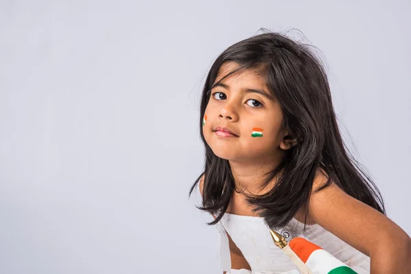 India flag and cute little indian girl, 4 year indian girl higging indian flag or tricolour, india flag & girl, girl holding indian flag, indian independence day indian republic day, isolated on white