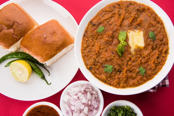 Pav Bhaji or paav bhaji, Indian spicy fast food with bread, onion and butter, Indian food, Mumbai food