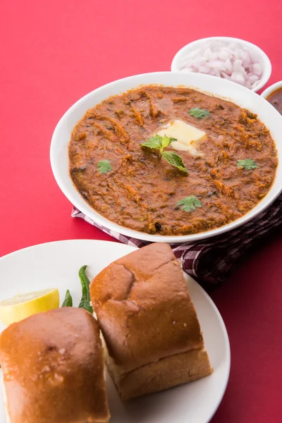 Pav Bhaji Indian spicy fast food with bread, onion and butter, Indian food, Mumbai food