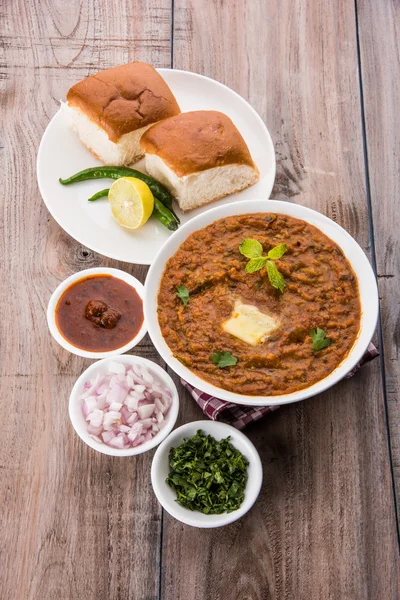 Pav Bhaji Indian spicy fast food with bread, onion and butter, Indian food, Mumbai food