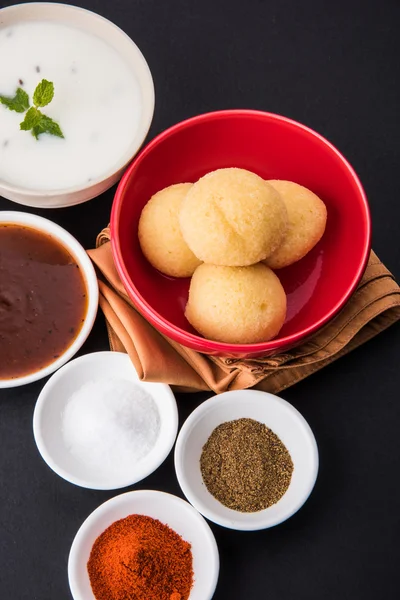 Dahi vada or dahi vade also known as Curd Vadai in South India, a popular snack famous all over India prepared by soaking lentil vadas in thick dahi or yogurt, topped with spicy & sweet chutney etc