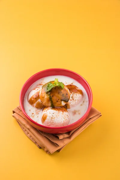 Dahi vada or dahi vade also known as Curd Vadai in South India, a popular snack famous all over India prepared by soaking lentil vadas in thick dahi or yogurt, topped with spicy & sweet chutney etc
