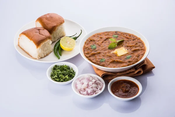 Pav Bhaji or paav bhaji, Indian spicy fast food with bread, onion and butter, Indian food, Mumbai food