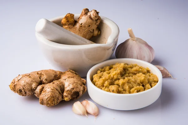Ginger and garlic paste or puree with 1 ginger and 1 garlic, closeup, selective focus