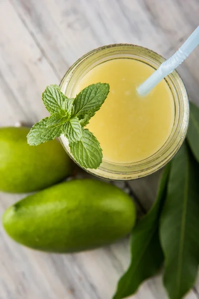 Green mango juice also known as kairi panha, aam panna, Mango Pahna, green mango drink, Fresh green mango smoothie with fresh green mangos