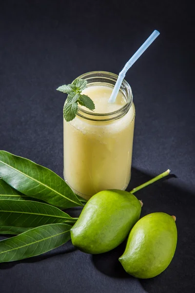 Green mango juice also known as kairi panha, aam panna, Mango Pahna, green mango drink, Fresh green mango smoothie with fresh green mangos