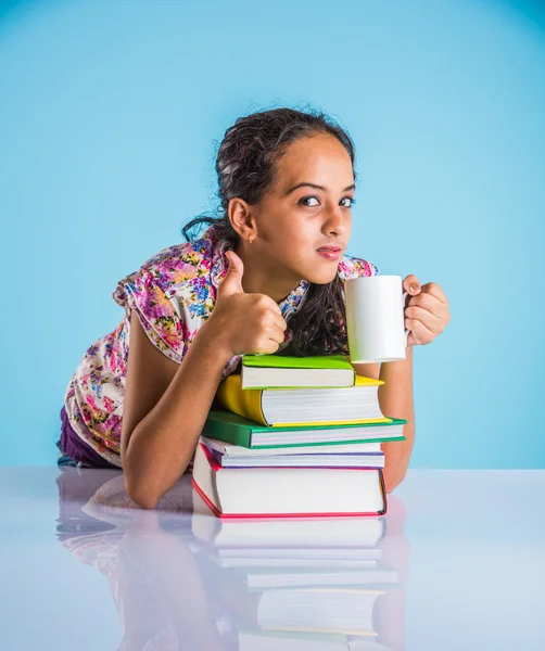 Portrait of confident and smiling indian girl student with pile of books, looking at camera, indian girl studying, asian girl and studying books