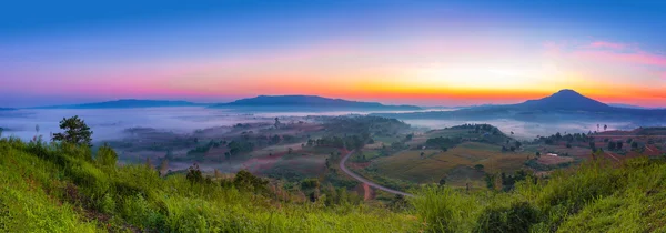 Panorama picture of beautiful sunrise, road and mountains