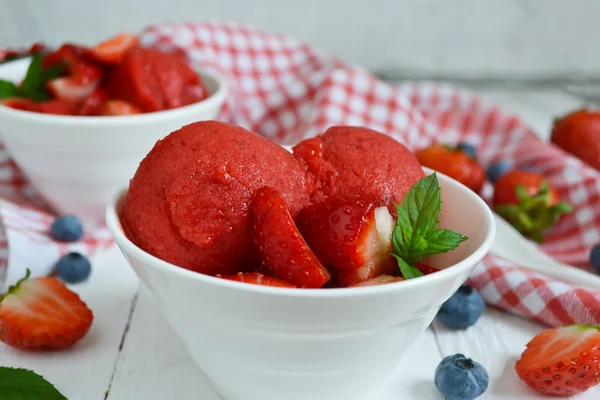 Cold, bright strawberry sorbet