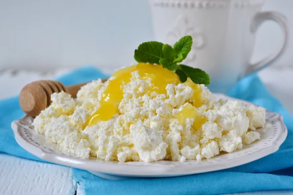 Grainy curd with honey for breakfast, a light snack