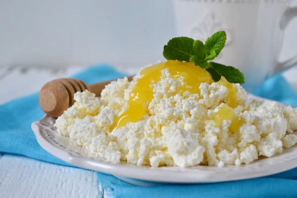 Grainy curd with honey for breakfast, a light snack