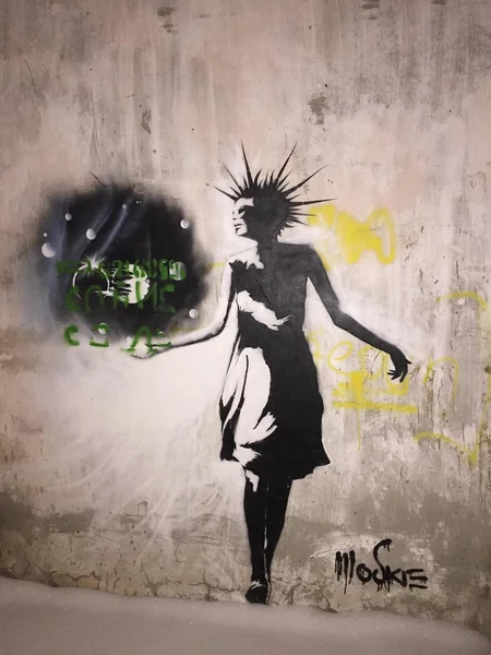 Graffiti of girl on wall