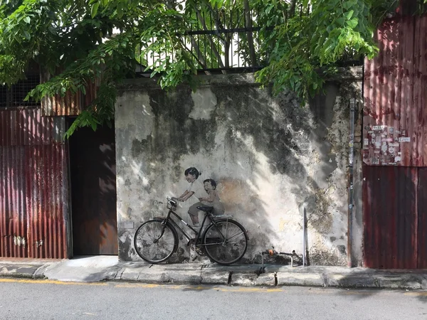 Kids on bicycle, street art in Penang