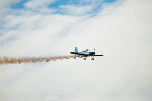 Stunt Plane with a Smoke Trail