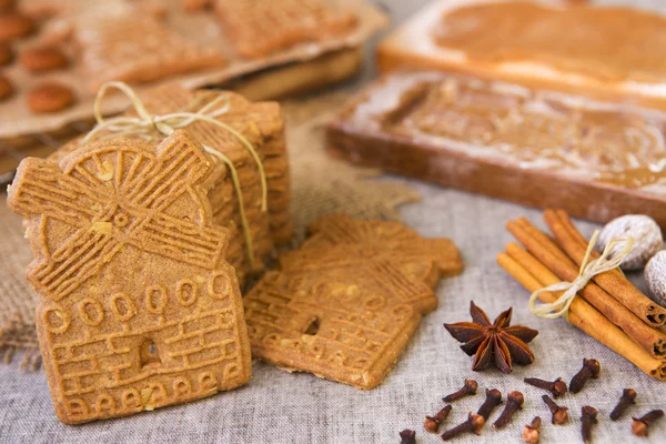 Typical Dutch speculaas cookies with authentic wooden cookie cutters