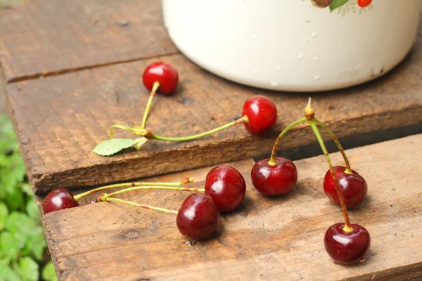 Cherry on the old wooden pallet