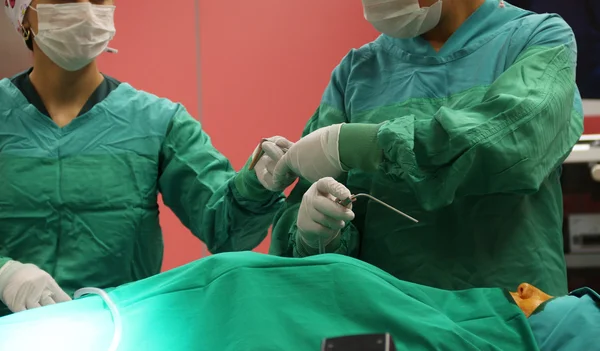 Plastic Surgery team operating in a surgical room