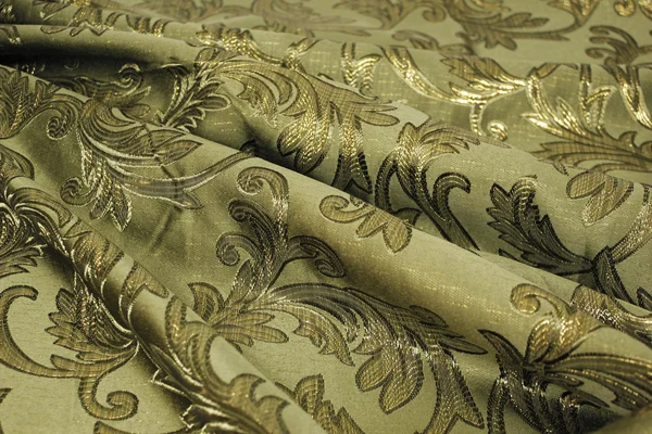 Green curtain fabric with a pattern