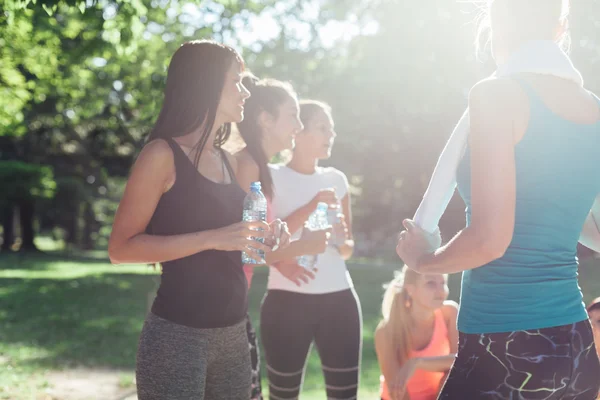 Young women after workout in park