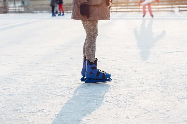 Woman skating at the rink