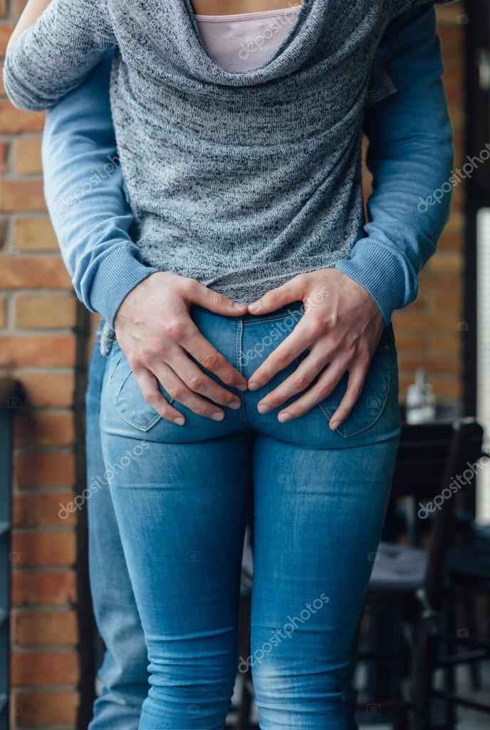 German woman tight jeans scissors