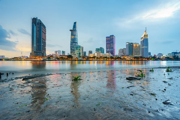 Night view of Business and Administrative Center of Ho Chi Minh city on Saigon riverbank, Vietnam