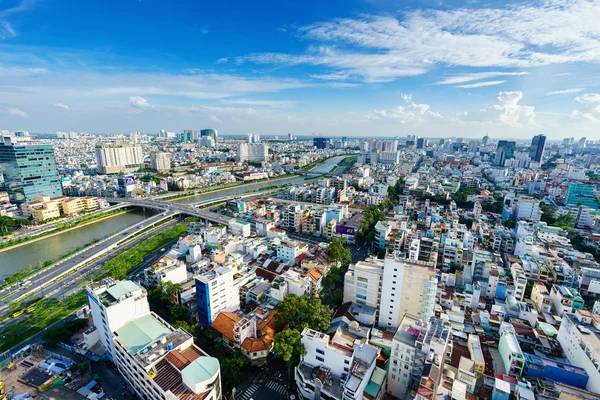 SAIGON, VIETNAM - JUNE 18, 2015. Ho Chi Minh city (or Saigon) skyline with colorful house in sunset, Vietnam. Saigon is the largest city in Vietnam with population around 10 million people.