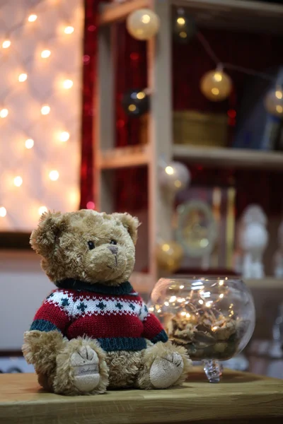 toy bear in a knitted sweater