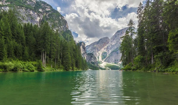 Cloudy landscape at Lake Braies. Peaceful location at Lago di Br