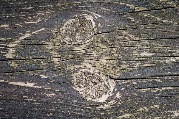 Aged wood texture with knot.