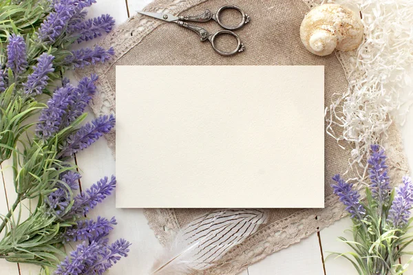 Artifical lavender flowers and blank paper Mockup.