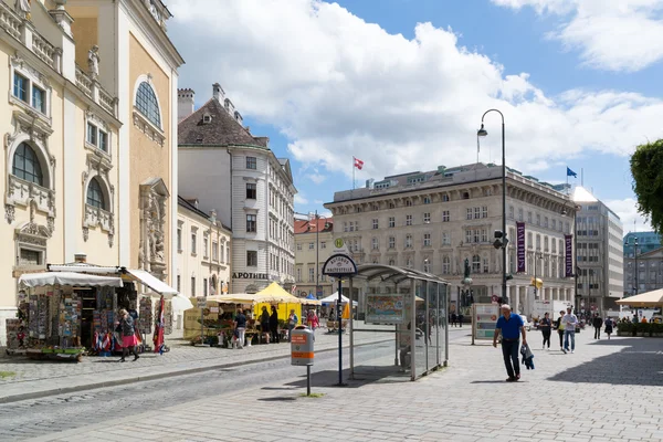 Freyung square street scene with people, Vienna, Austria