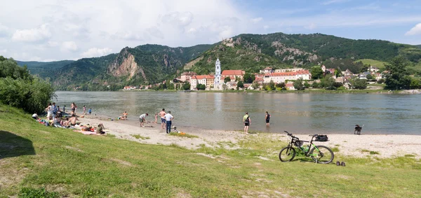 People enjoying Danube river in Durnstein, Wachau, Austria