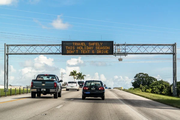 Text and drive warning on electronic message board in Florida