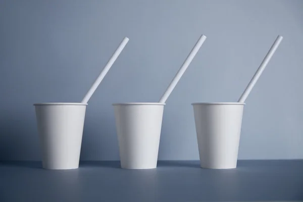 Three take away white paper cups