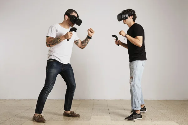 Two men fighting in VR glasses