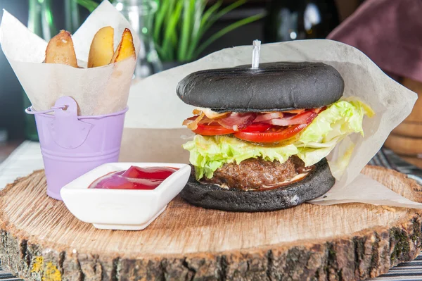 Modern black Burger with beef meat
