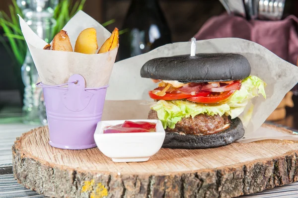 Modern black Burger with beef meat