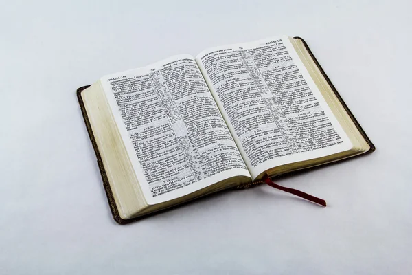 Open Bible on White Background
