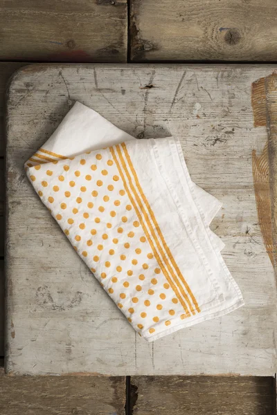 White Dinner Napkin with Orange Polka Dots and Stripes Design