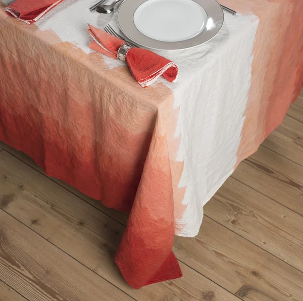 Set Dinnerware on Table with Gradient Orange Zigzag Design Table