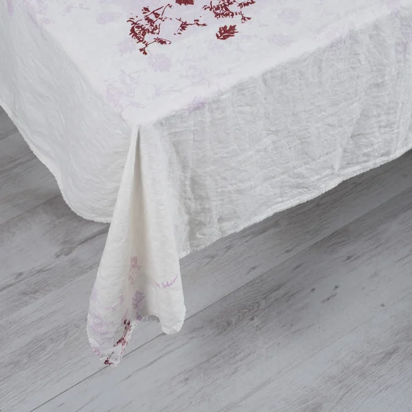 White Tablecloth with Red Floral Accents