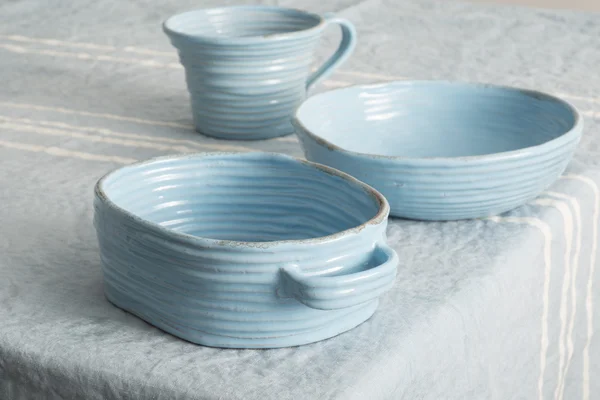 Set of Blue Earthenware on Blue Linen