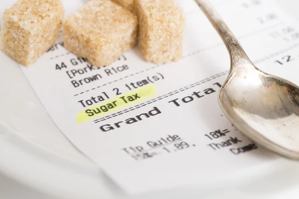 Sugar tax receipt with sugar lumps