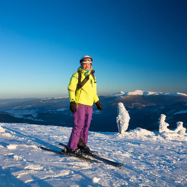 Happy woman in Mountains ski resort