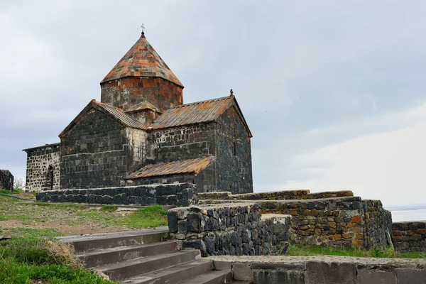 Shrine of the Armenian people. Temple on Lake Sevan. Thunder Sky